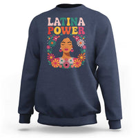 Navy crewneck sweatshirt with "Latina Power" floral portrait graphic on front