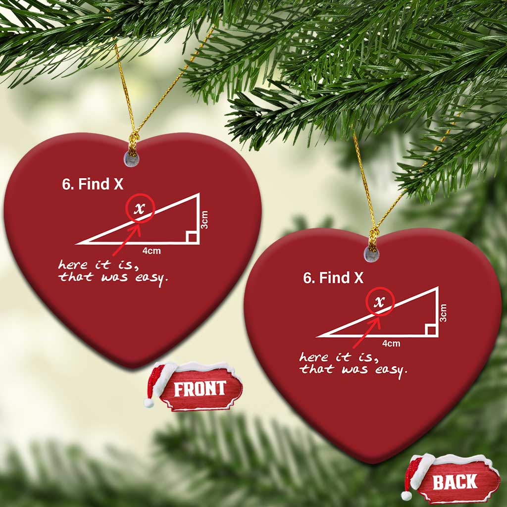 Red heart-shaped Christmas ornament with '6. Find X' math diagram, hanging on gold string.