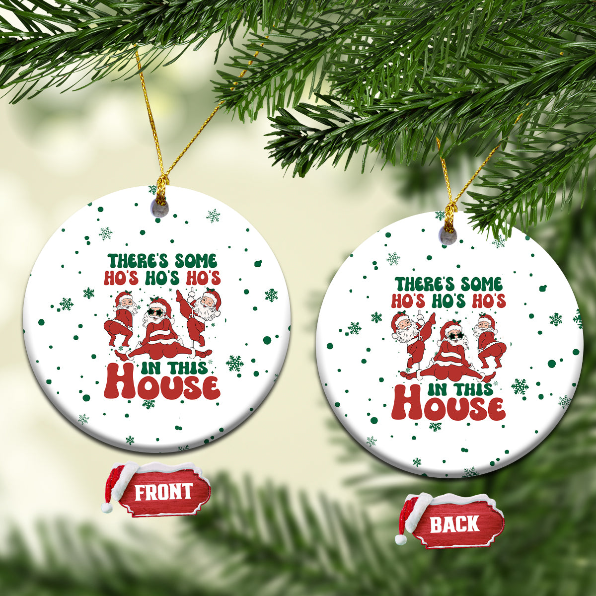 White ceramic Christmas ornament, round shape with gold loop and red “in this House” text