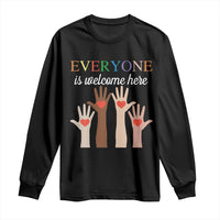 Black long sleeve shirt with “Everyone is welcome here” heart-hand graphic