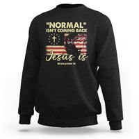 Black crewneck sweatshirt with front religious quote graphic: "Jesus is"