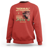 Red crewneck sweatshirt with front religious quote graphic: "Jesus is"