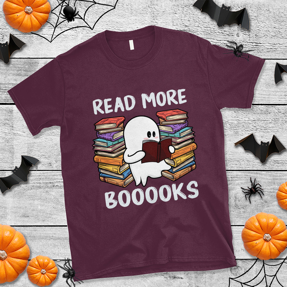 Maroon crewneck T-shirt with ghost reading books graphic and 'READ MORE BOOOOKS'.
