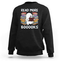 Black Halloween reading sweatshirt with cute ghost holding a book graphic, text “READ MORE BOOOOKS”.