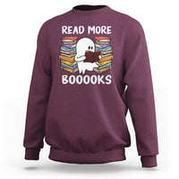 Maroon Halloween reading sweatshirt featuring a cute ghost holding a book, “READ MORE BOOOOKS” print.