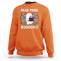 Orange Halloween reading sweatshirt with cute ghost holding a book, “READ MORE BOOOOKS” front text.