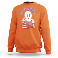 Orange ghost reading books sweatshirt with “Booooks” graphic on front
