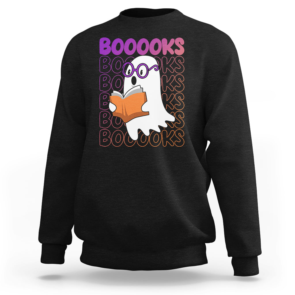 Black crewneck sweatshirt with cartoon ghost reading orange book and 'BOOOOKS' text