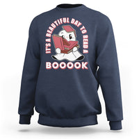 Navy Halloween sweatshirt with ghost reading book graphic and 'BOOOOK' text.