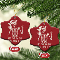 Red bell-shaped Christmas ornaments with white skeleton and coffee mug, “IT’S FINE...” text