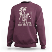 Maroon crewneck skeleton sweatshirt with coffee cup and “It’s fine, everything’s fine” print