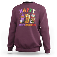 Maroon unisex sweatshirt with colorful Happy Hallothanksmas graphic on chest