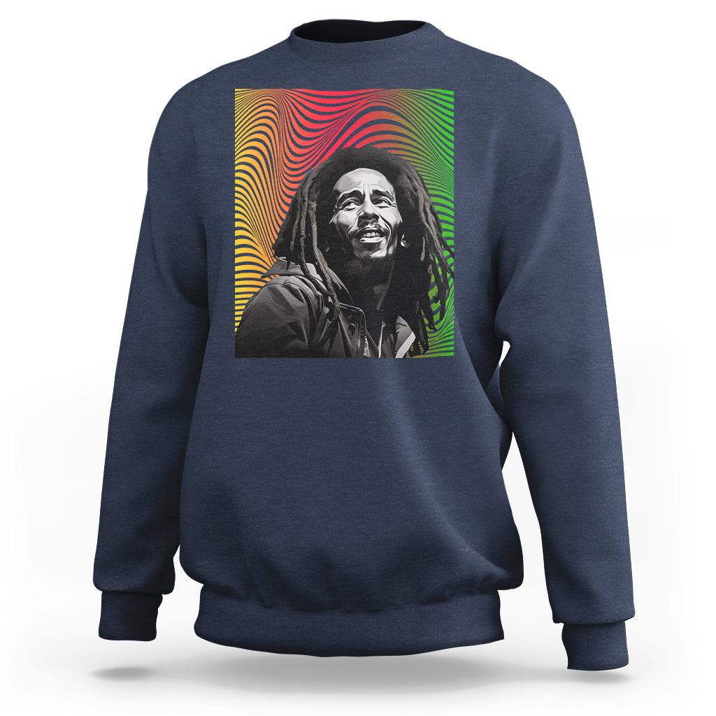 Slate blue crewneck sweatshirt with colorful reggae-style portrait graphic on back.