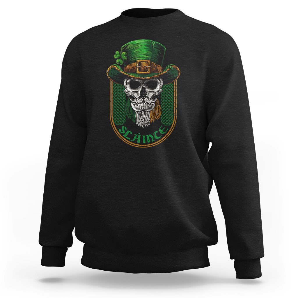Black crewneck sweatshirt with green skull graphic on the chest