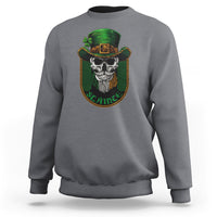 Charcoal gray crewneck sweatshirt with green skull graphic on the chest