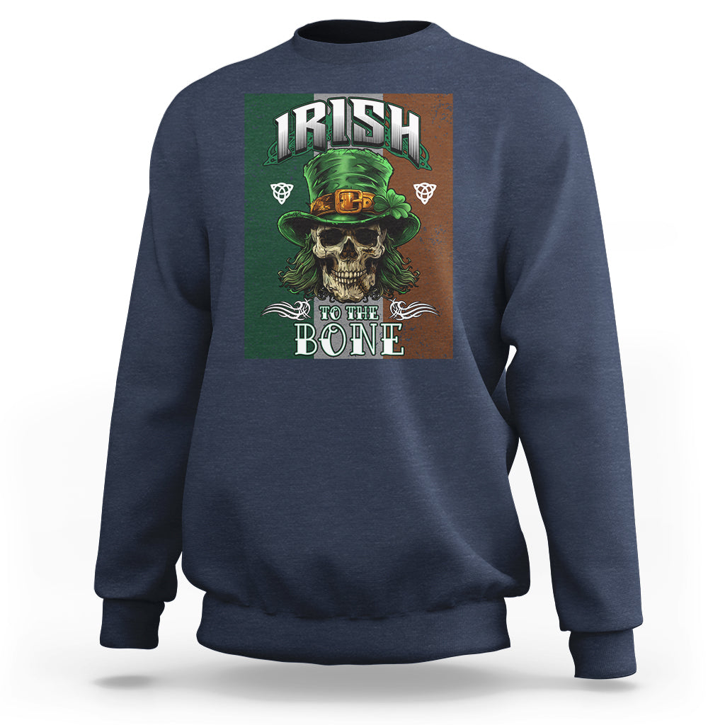 Blue crewneck sweatshirt with skull wearing hat graphic and "IRISH TO THE BONE" text.