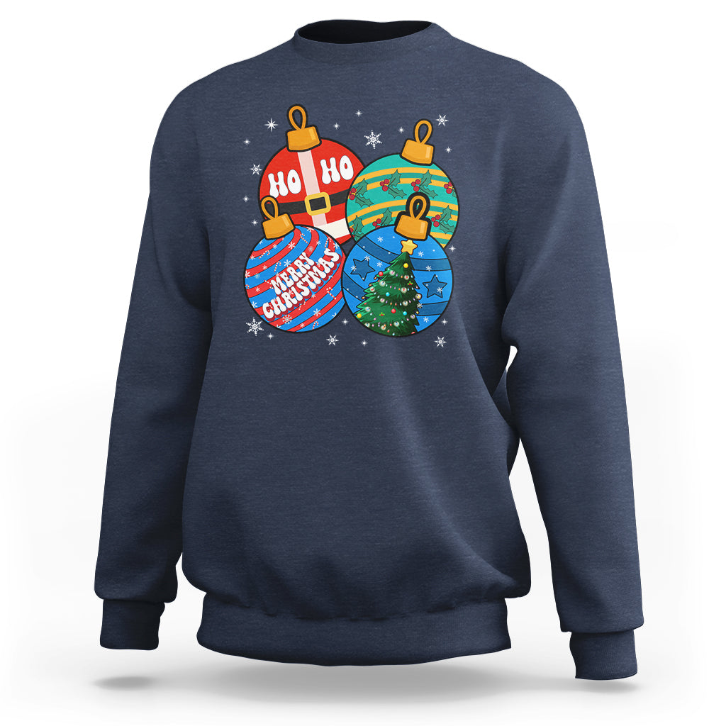 Navy crewneck Christmas sweatshirt with colorful ornament graphic and "Ho Ho Ho" text