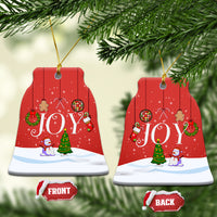 Red ceramic ornament pair with “JOY” on round backs, gold hanging loops, front/back labels.