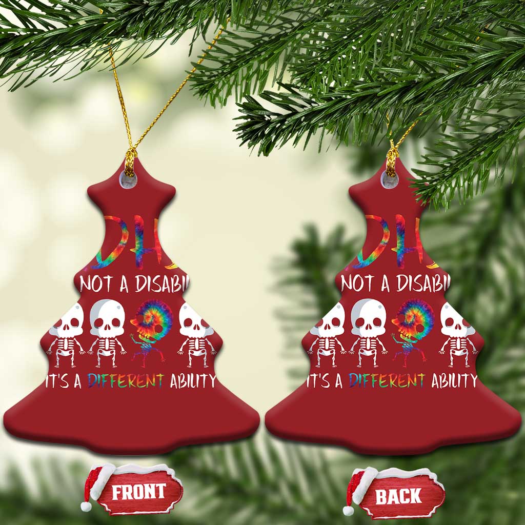 Two red bell-shaped ADHD ornaments with colorful ADHD text and skull graphic on tree branches.
