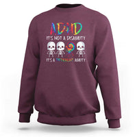 Maroon crewneck sweatshirt with colorful ADHD graphic and skull design on chest