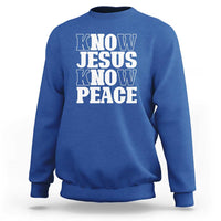 Royal blue crewneck sweatshirt with "KNOW JESUS KNOW PEACE" graphic on the front.