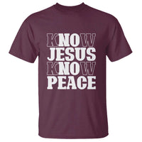 Maroon graphic T-shirt with 'KNOW JESUS KNOW PEACE' front print.