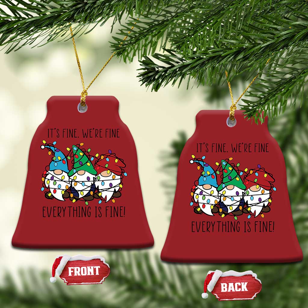 Red bell-shaped Christmas ornament with gnome illustration, gold hanging loop