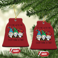 Red bell-shaped Christmas ornament with gnome illustration, gold hanging loop