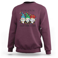 Maroon crewneck sweatshirt with colorful gnome graphic and "It's fine" "Everything is fine" text