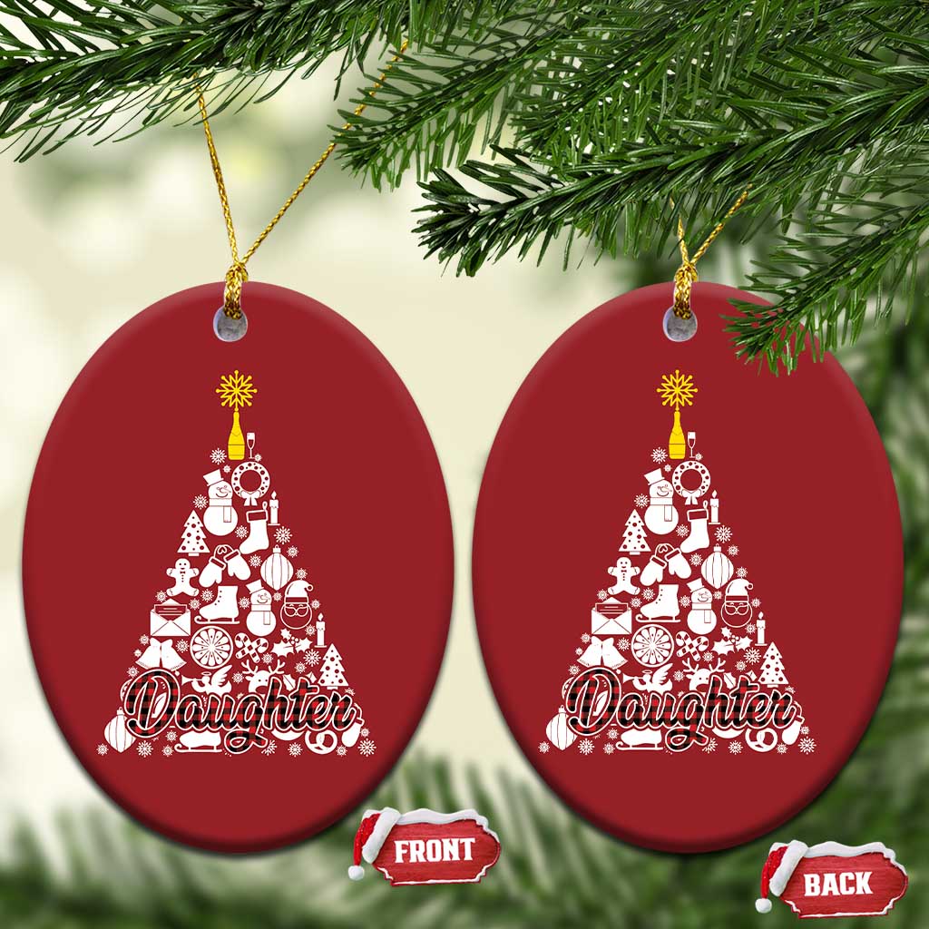Two red round Christmas ornaments with white tree design; gold hooks and "Daughter" text