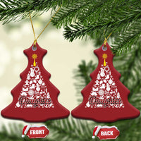Two red bell-shaped Christmas ornaments with gold hooks and white "Daughter" tree graphic