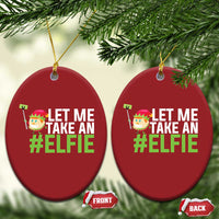 Two red oval elf selfie Christmas ornaments, 'LET ME TAKE AN #ELFIE' text