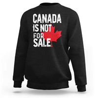 Black crewneck sweatshirt with distressed 'Canada is not for sale' text and red maple leaf.