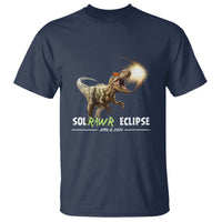 Dinosaur solar eclipse T-shirt, navy with dinosaur artwork and “SOLRAWR ECLIPSE” text