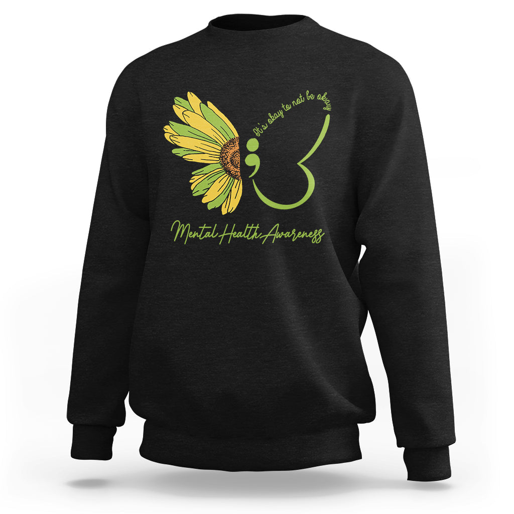 Black sweatshirt with yellow-green butterfly graphic and “Mental Health Awareness” print