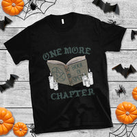 Black crewneck witch graphic T-shirt with open book and spell design on chest