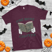 Maroon crewneck witch graphic T-shirt with open book and spell design on chest