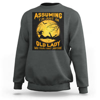 Dark heather gray Halloween witch sweatshirt with moon and broomstick graphic and quote.