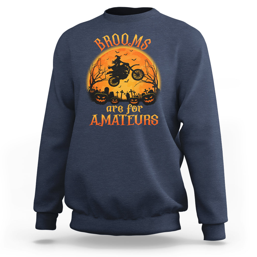 Navy crewneck sweatshirt with Halloween broom rider graphic and orange text