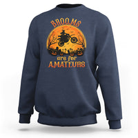 Navy crewneck sweatshirt with Halloween broom rider graphic and orange text