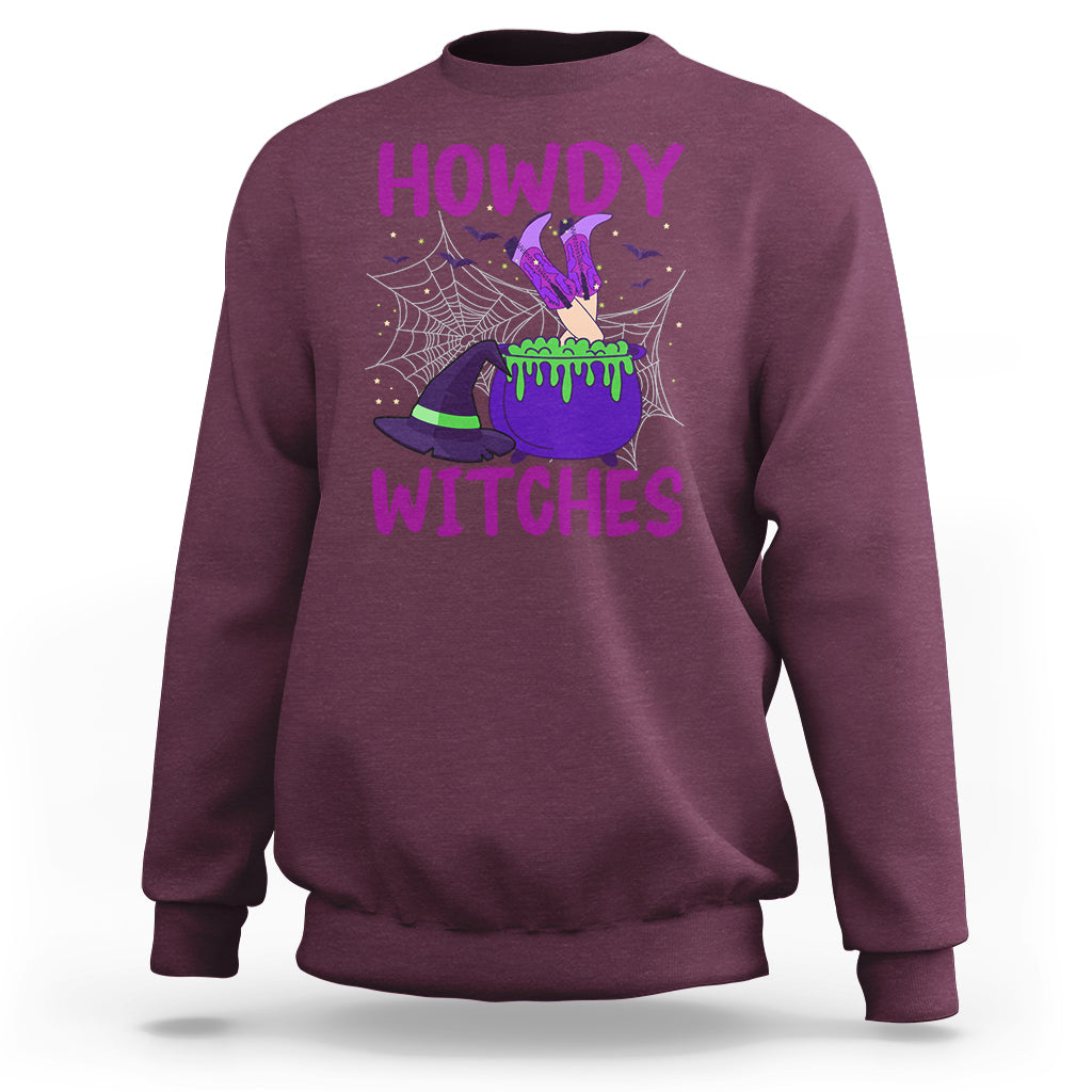 Maroon Halloween witch sweatshirt with “HOWDY WITCHES” graphic and spiderweb design