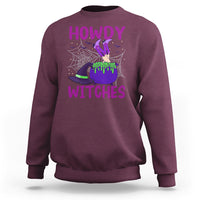 Maroon Halloween witch sweatshirt with “HOWDY WITCHES” graphic and spiderweb design