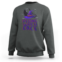 Dark heather sweatshirt with purple witch cat graphic and "resting witch face" lettering