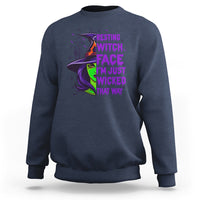 Navy witch graphic sweatshirt with resting witch face print on chest.