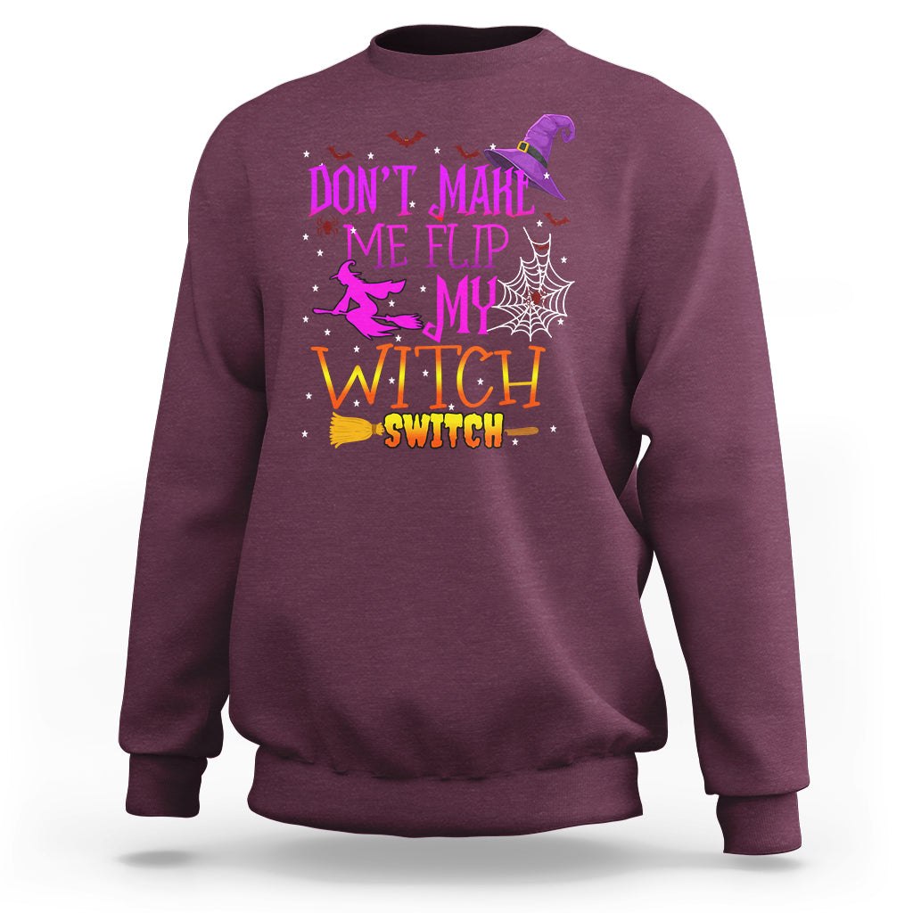Maroon Halloween sweatshirt with witch switch slogan graphic on front