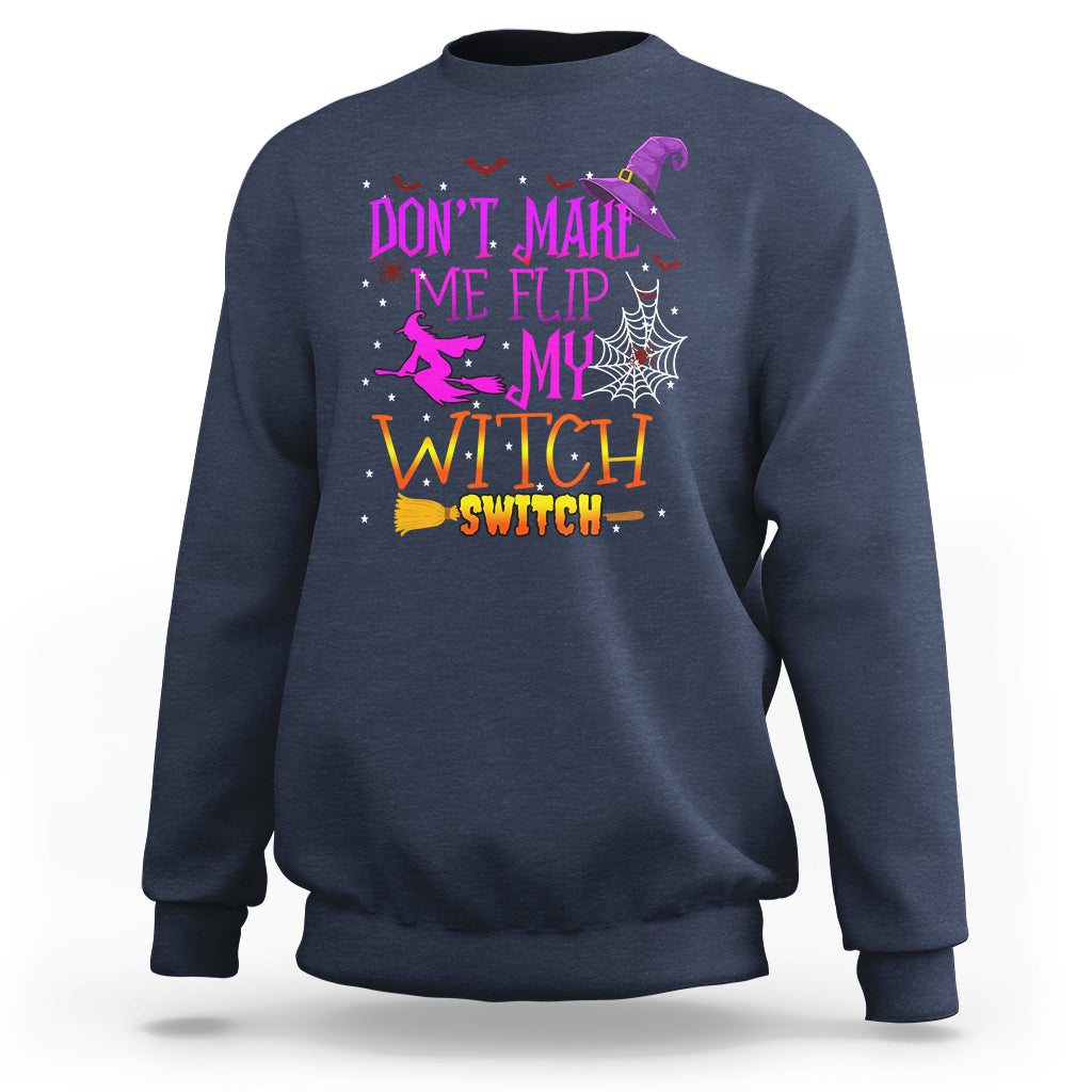 Navy Halloween sweatshirt with witch switch slogan graphic on front