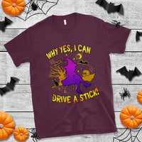 Maroon Halloween witch crewneck T-shirt with neon “Why yes, I can drive a stick” graphic