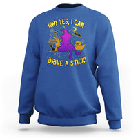 Royal blue Halloween witch sweatshirt with purple witch graphic and yellow 'DRIVE A STICK' text.
