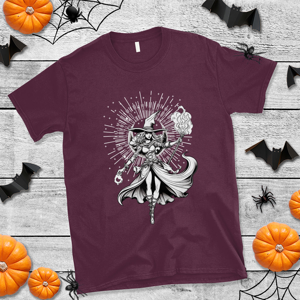 Maroon witch graphic T-shirt with centered monochrome witch and moon burst