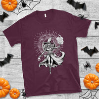 Maroon witch graphic T-shirt with centered monochrome witch and moon burst